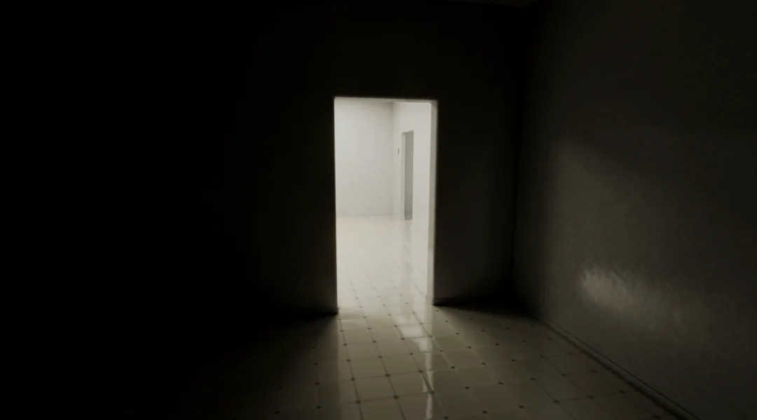 A white doorway in a dark room.