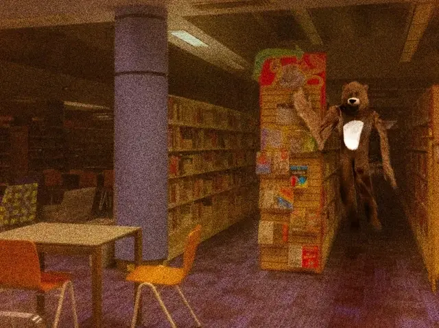A teddy bear in a brown costume standing in a room with a bookshelf.