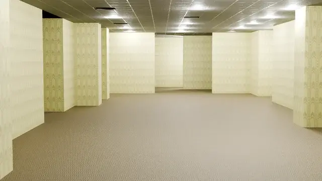 A long hallway with white walls and doors.