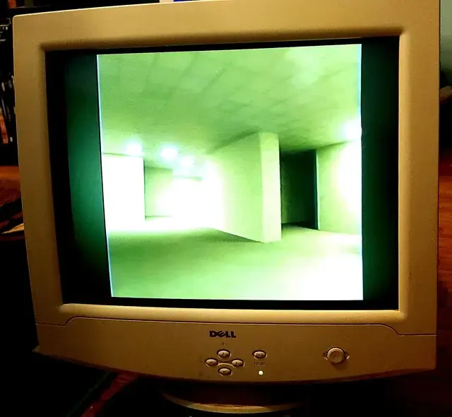 A computer monitor displaying a backroom scene.