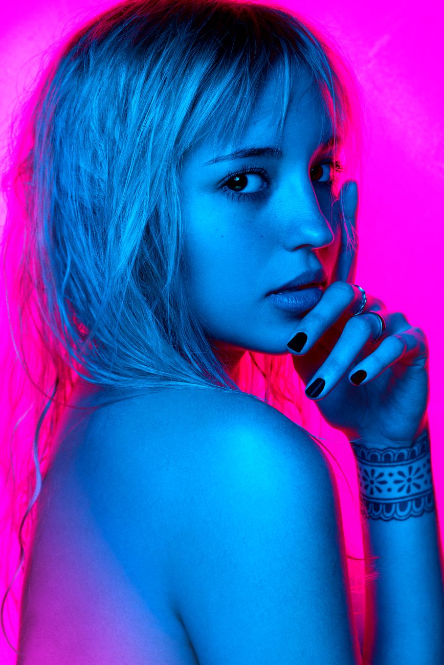 Cyan key, magenta fill — the signature frame